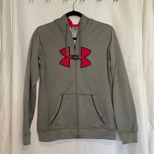 Under Armour/ Women’s long sleeve zip up hooded jacket.​​​​​​​